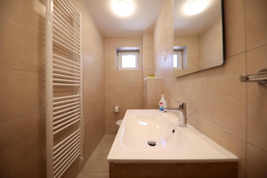 Kúpeľňa v ubytovaní Apartmani Diklo