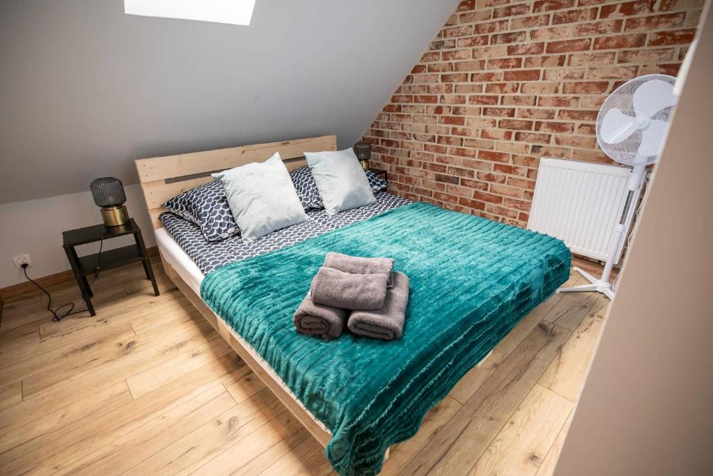 Posteľ alebo postele v izbe v ubytovaní Loft Króla Kazimierza