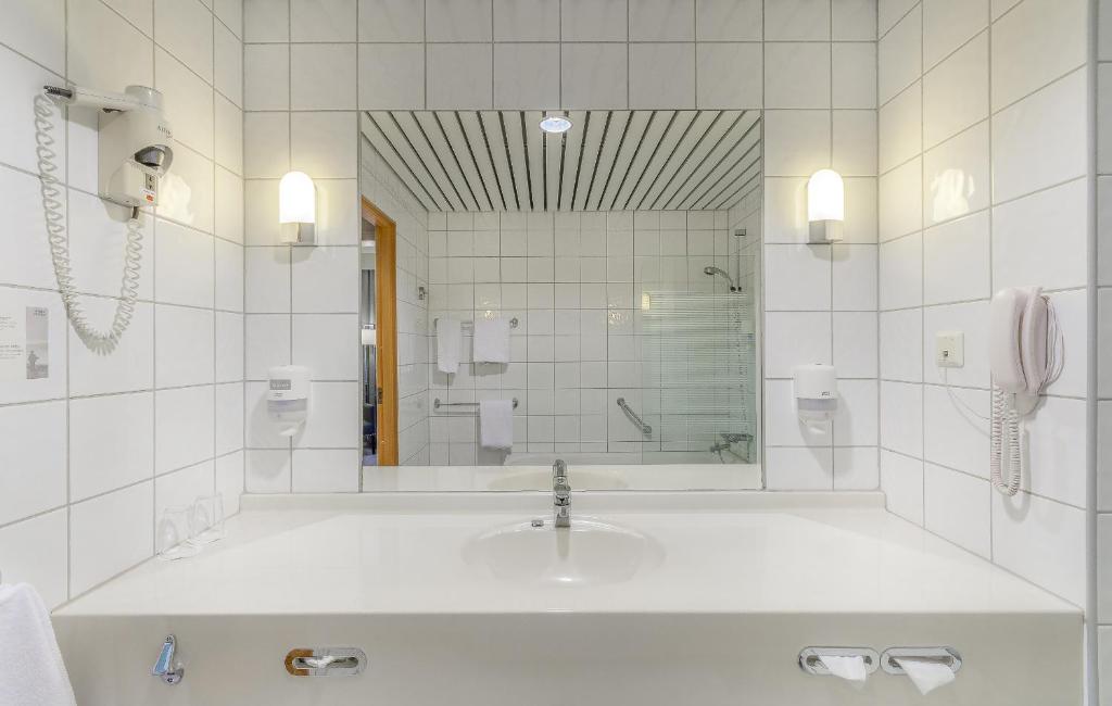 Koupelna v ubytování Soria Moria Hotell