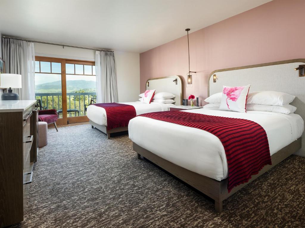 Postel nebo postele na pokoji v ubytování Hotel Corque