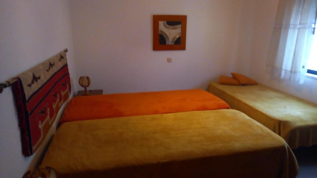 Postel nebo postele na pokoji v ubytování Apartamento na Praia