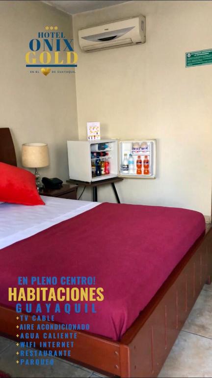 Letto o letti in una camera di Hotel Onix Gold