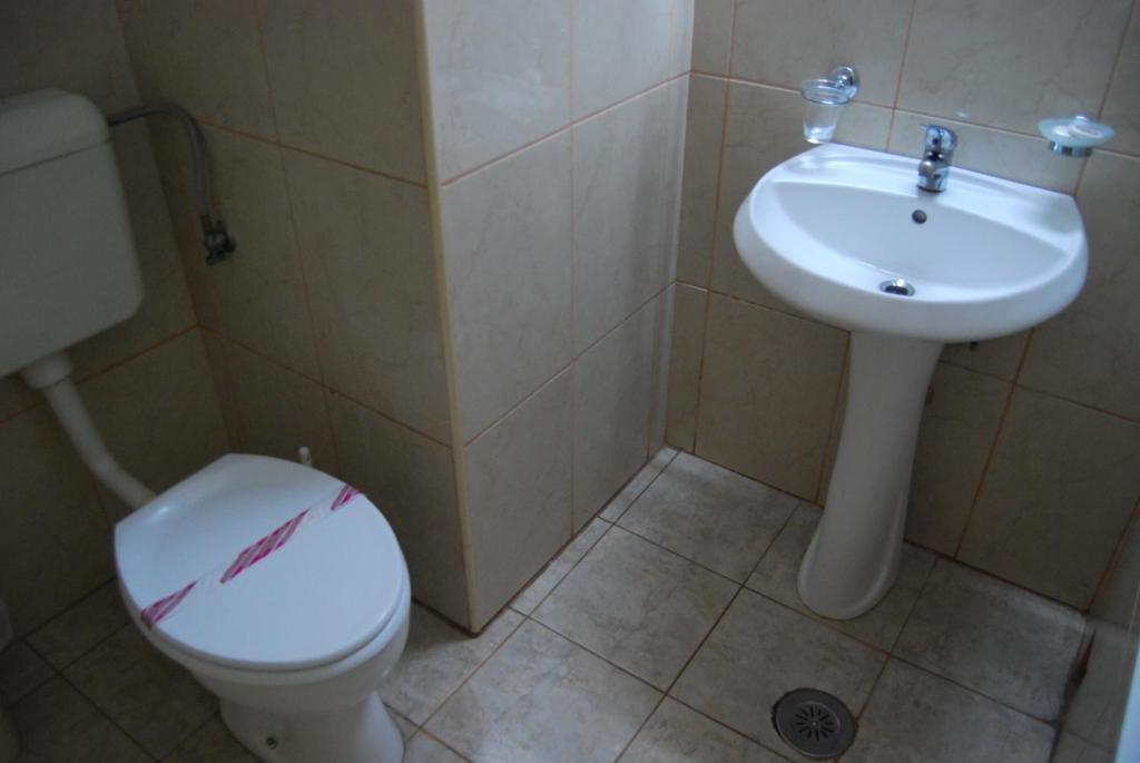 Koupelna v ubytování Hotel Maria