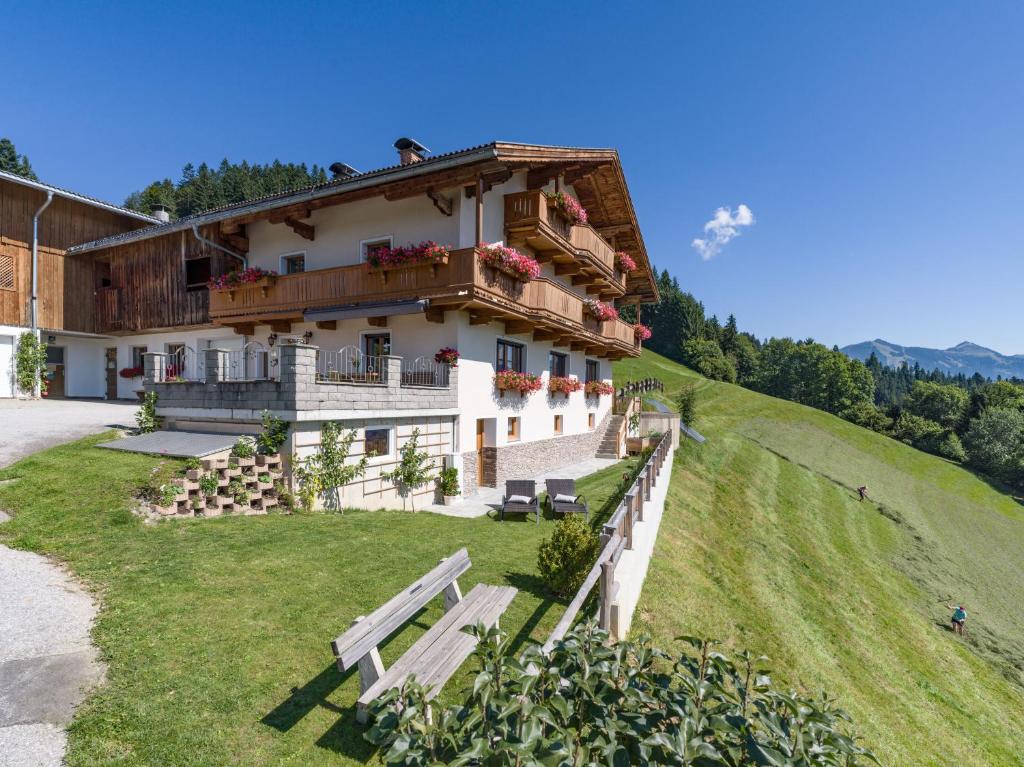 a building on the side of a hill at Haus Hofbichl in Itter