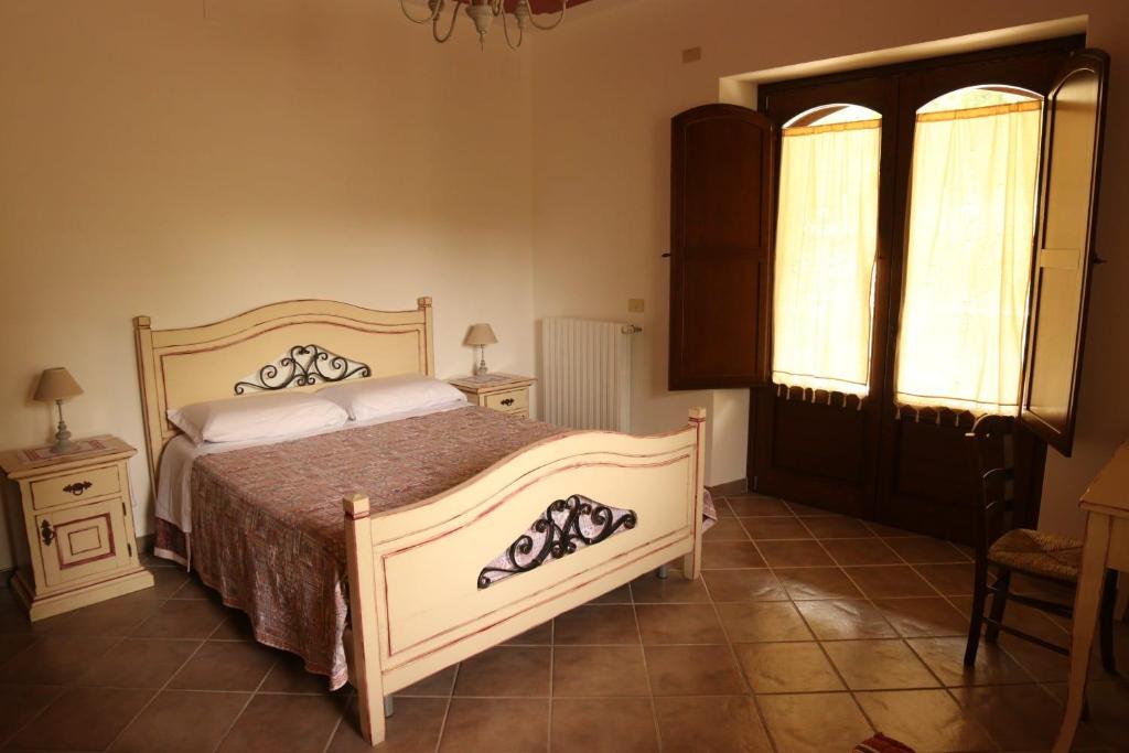 Postel nebo postele na pokoji v ubytování Villa Manca