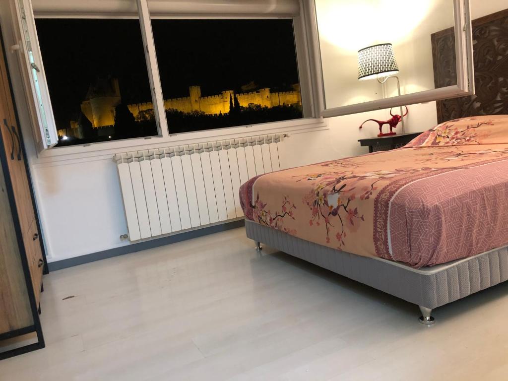 Un pat sau paturi într-o cameră la Casa Del Castell
