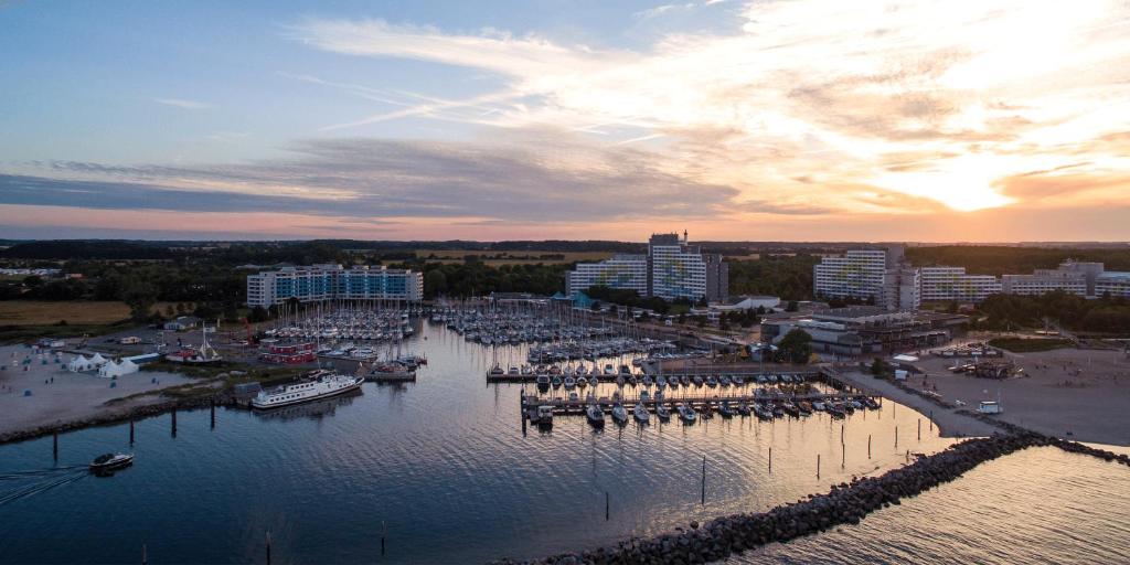 an aerial view of a marina with boats in the water at Ostseehotel Midgard im Dampland in Damp