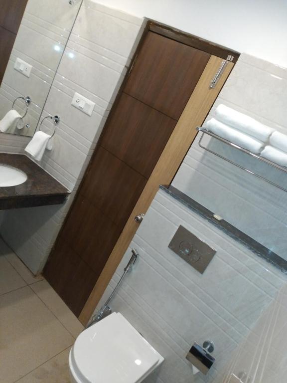Koupelna v ubytování HOTEL NILADRI PREMIUM