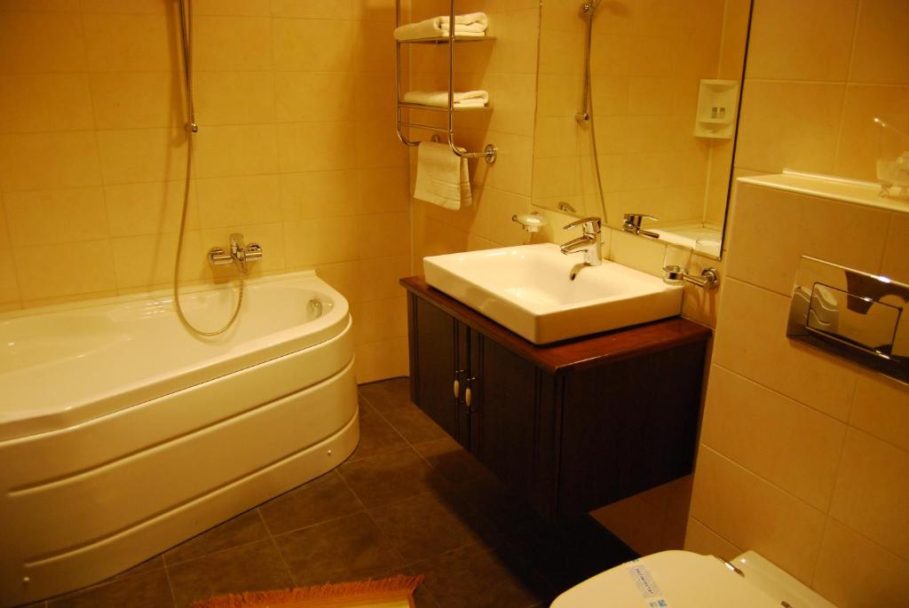 Koupelna v ubytování Hotel Zodiac