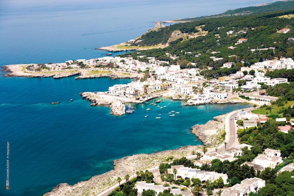 an aerial view of a small town on the coast at Santa Caterina Resort in Santa Caterina di Nardò