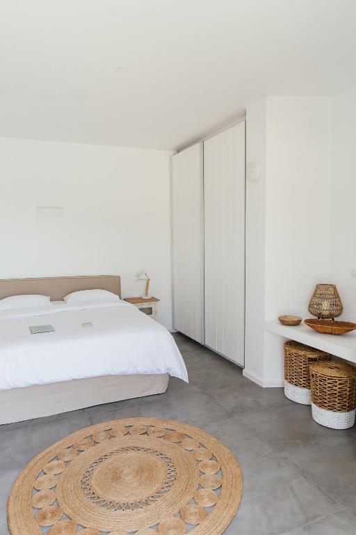Postel nebo postele na pokoji v ubytování Pino di Loto Boutique Bed & Breakfast