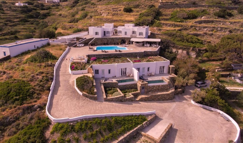 an aerial view of a large house on a hill at Pino di Loto Boutique Bed & Breakfast in Kini