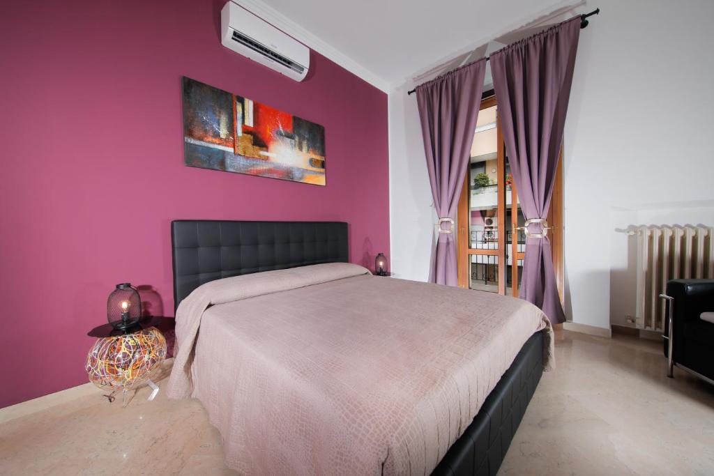 A bed or beds in a room at Suite Gaia