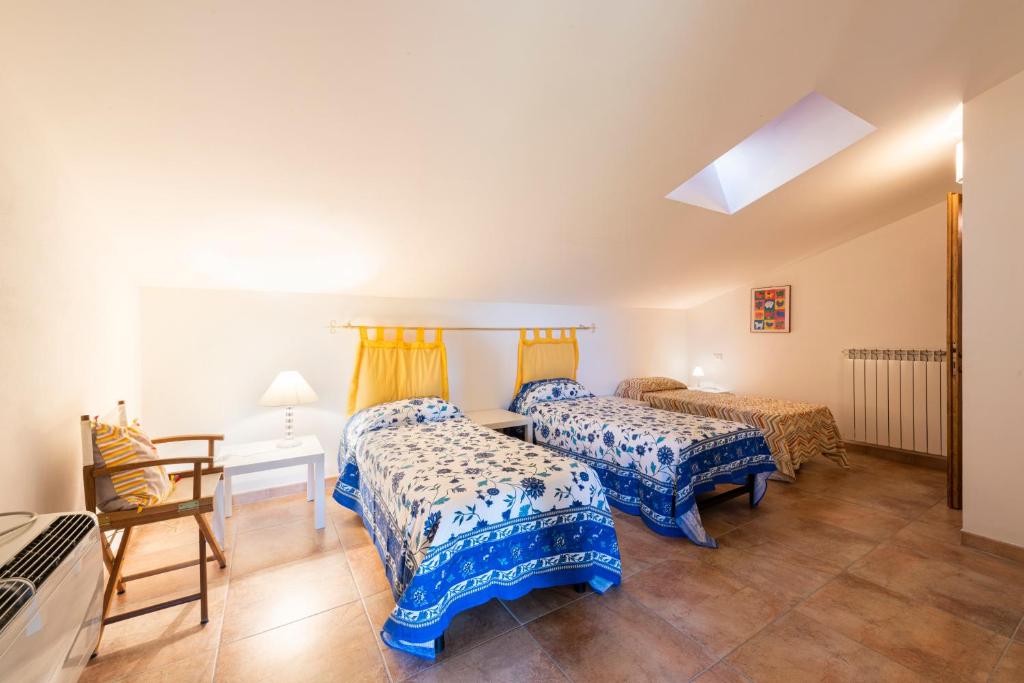 Postel nebo postele na pokoji v ubytování Villa Clemente by Mmega
