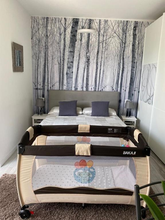 Postel nebo postele na pokoji v ubytování Residenza I Laghi