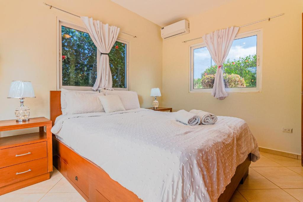 Postel nebo postele na pokoji v ubytování House 24 in Casa Linda