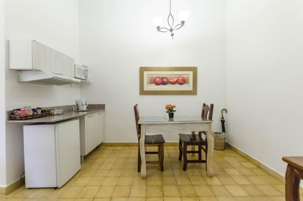 Kuchyň nebo kuchyňský kout v ubytování La Casona Hotel Boutique