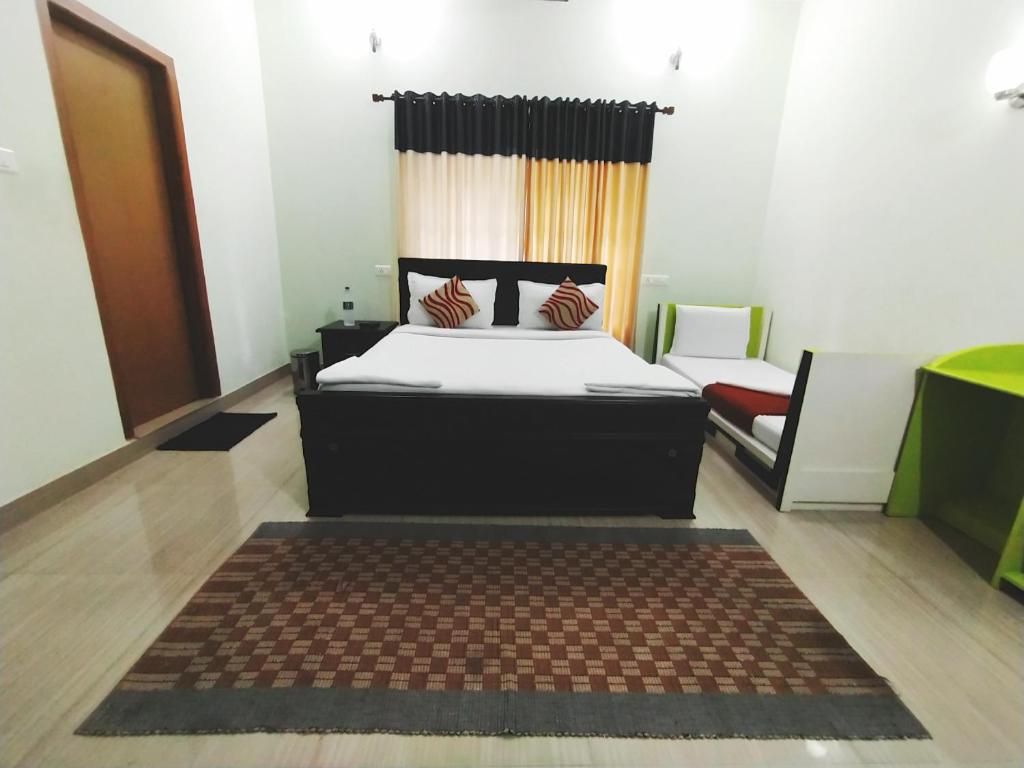 Postel nebo postele na pokoji v ubytování Dreamnest Residency