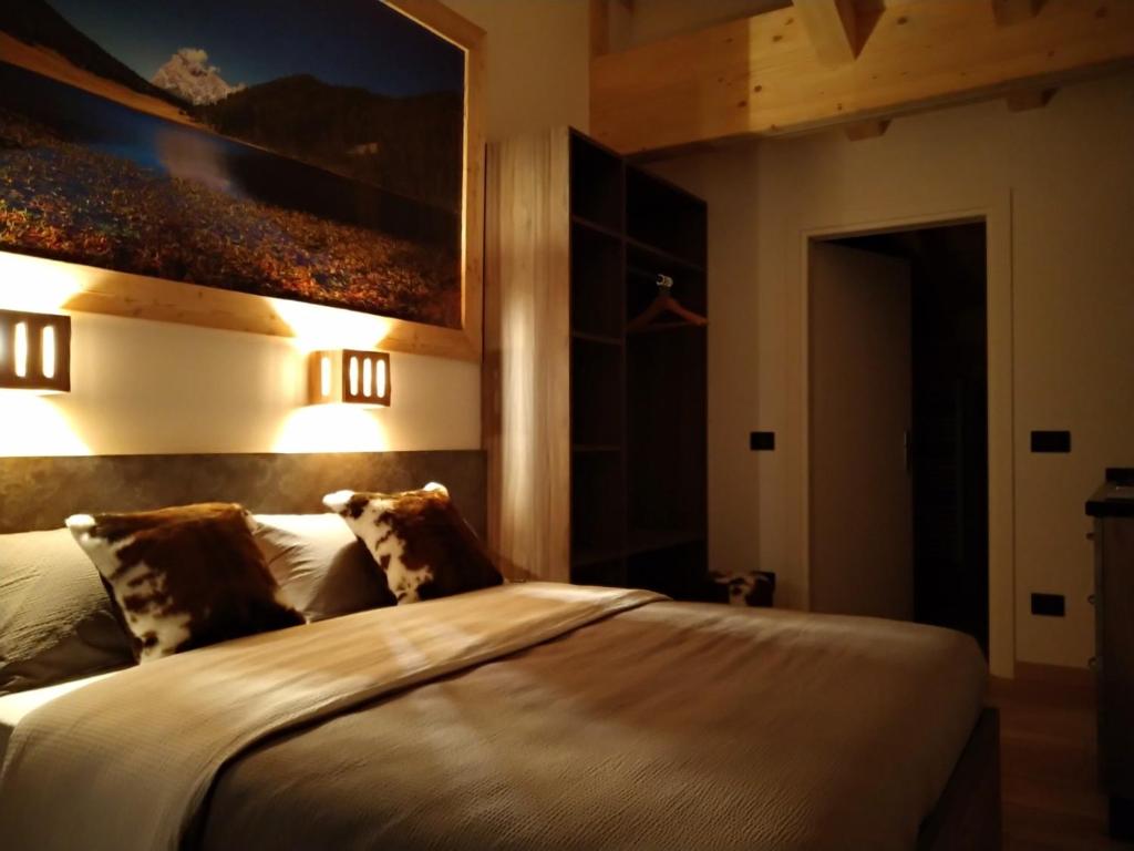 Postel nebo postele na pokoji v ubytování Alpenrooms