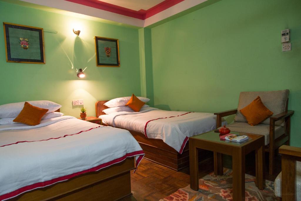 Voodi või voodid majutusasutuse Hotel Utse toas
