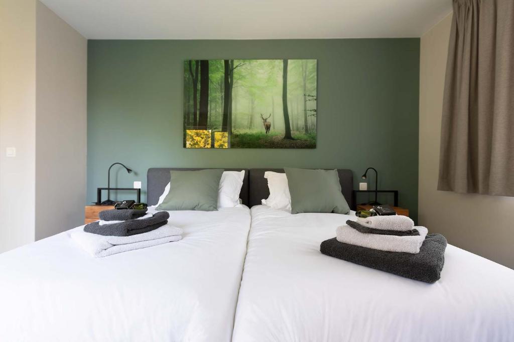 Postel nebo postele na pokoji v ubytování BEUKENHOUSE