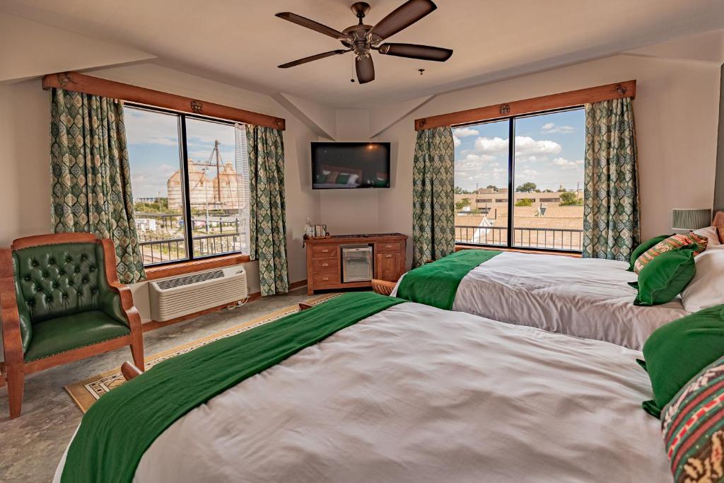 Postel nebo postele na pokoji v ubytování Pivovar Hotel