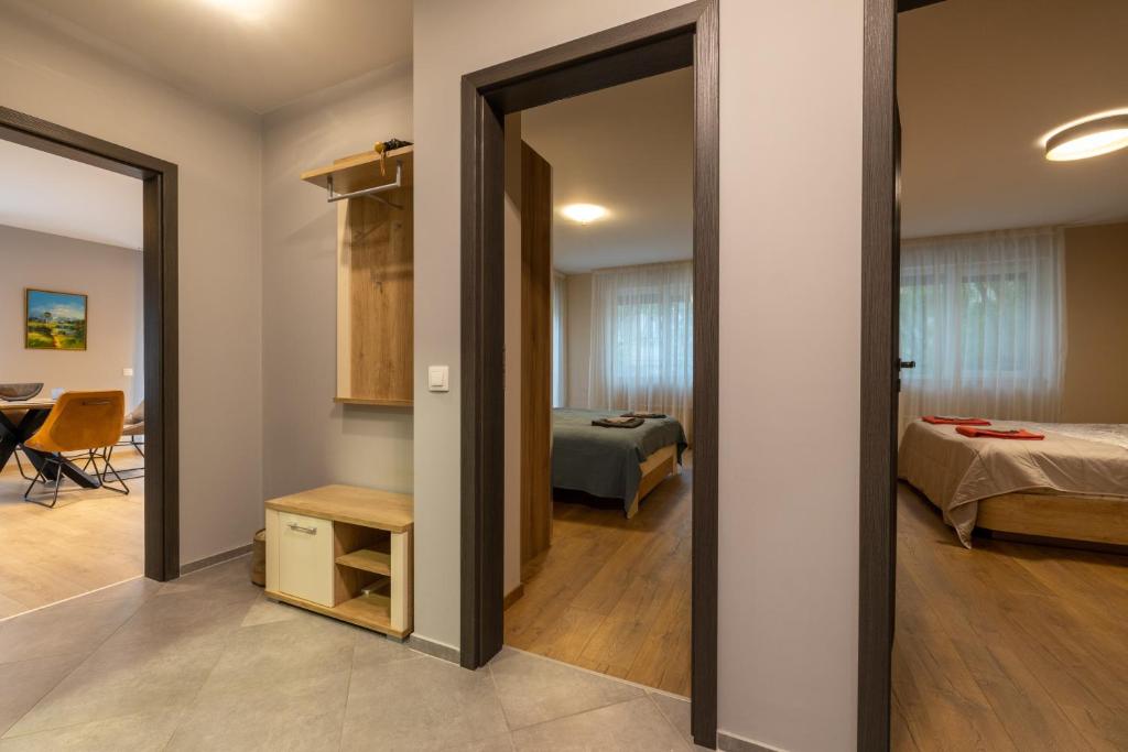 A bed or beds in a room at Apartment City Home