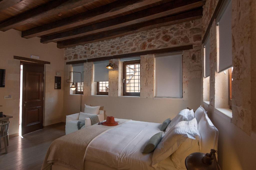 Postel nebo postele na pokoji v ubytování Serenissima Boutique Hotel