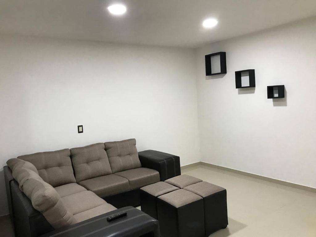 Posezení v ubytování Casa minimalista tranquila y acogedora, con garage