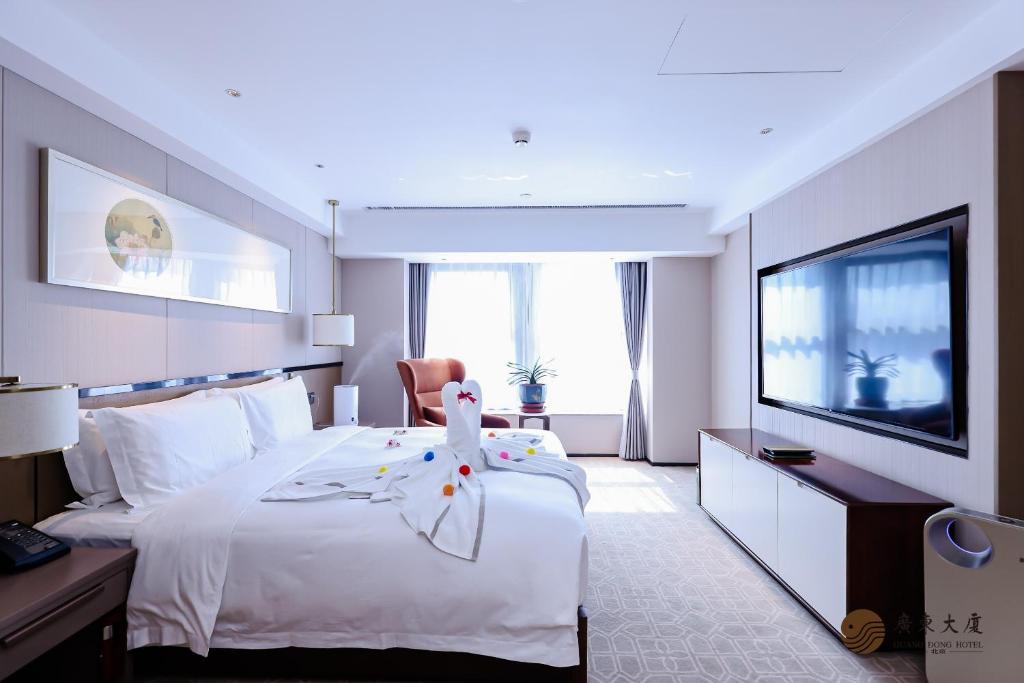 TV a/nebo společenská místnost v ubytování Beijing Guangdong Hotel