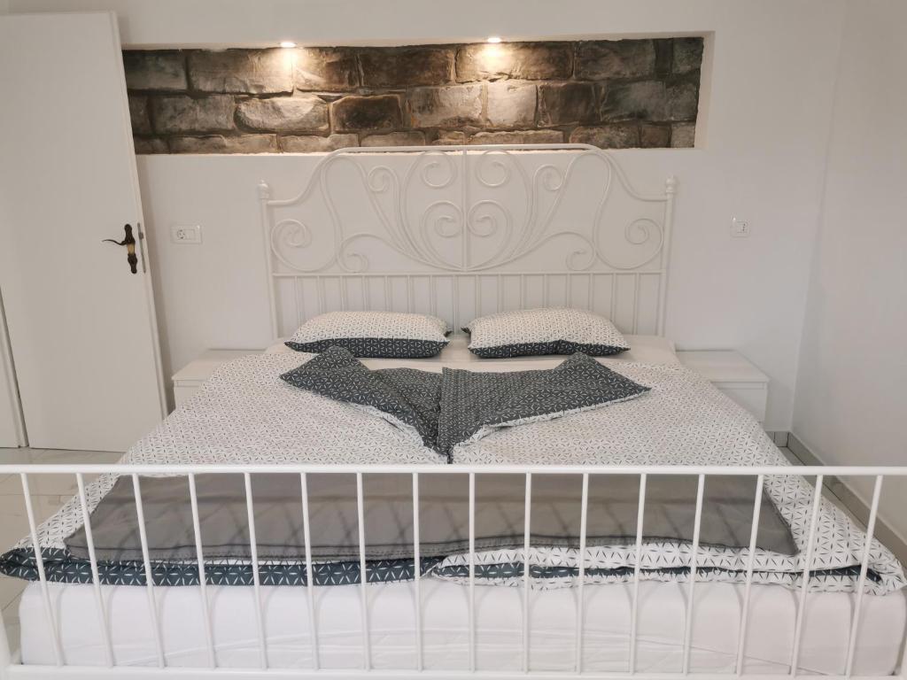 Postel nebo postele na pokoji v ubytování APARTMA KANTINA