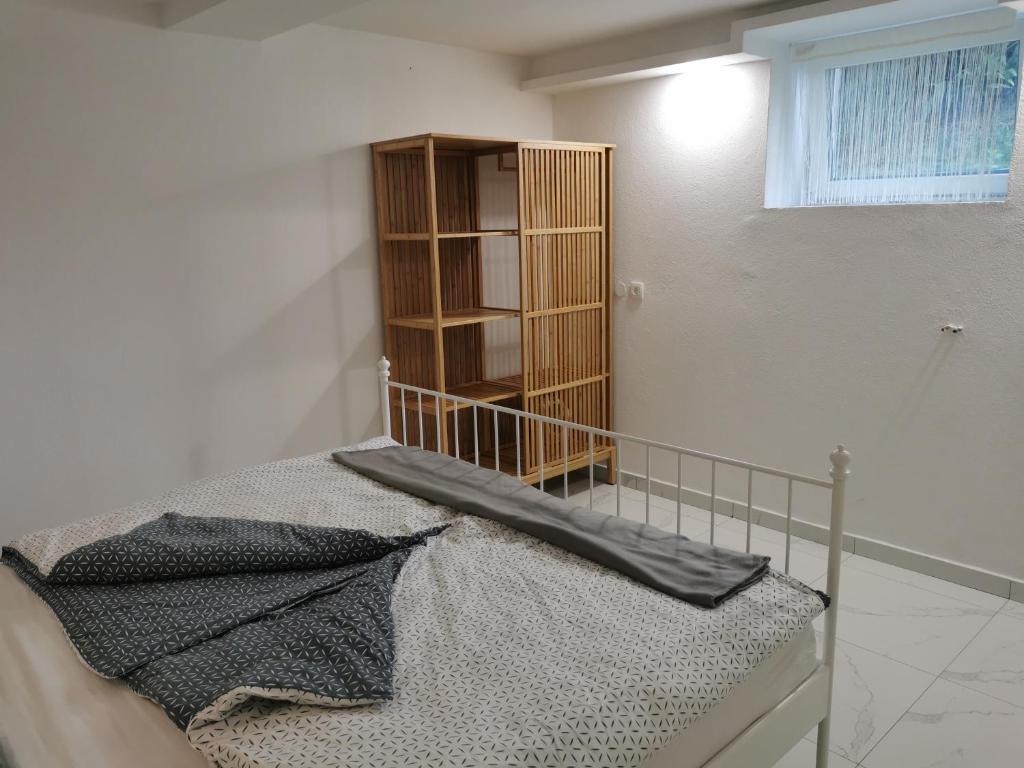 Postel nebo postele na pokoji v ubytování APARTMA KANTINA