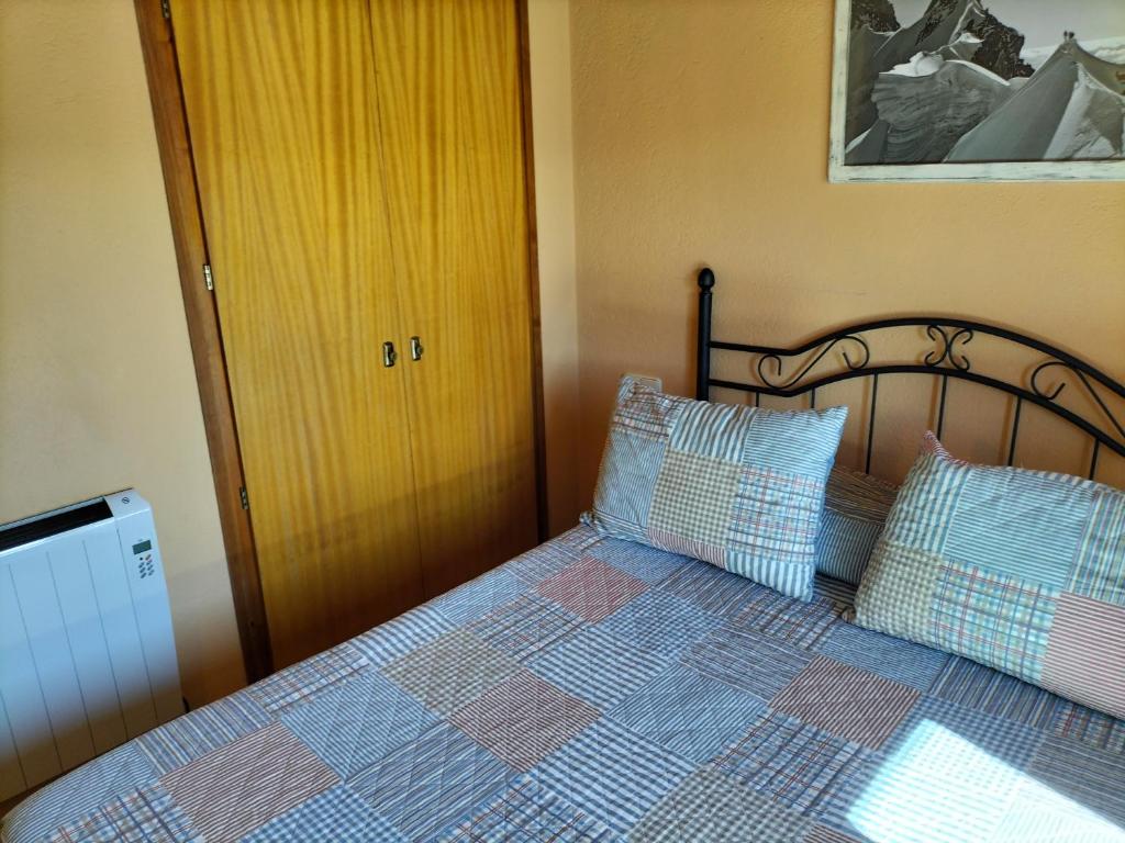 Postel nebo postele na pokoji v ubytování Cal Rafalet