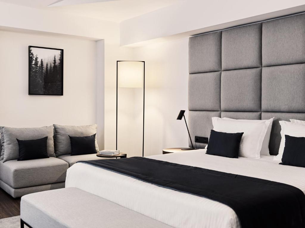 Postel nebo postele na pokoji v ubytování Vanoro Hotel