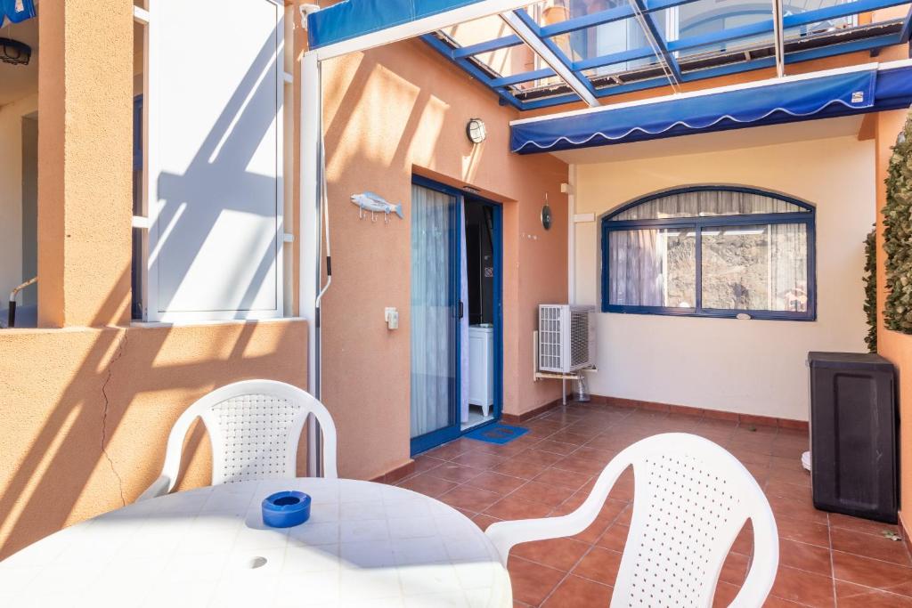 Posezení v ubytování Flatguest Balcon de Taurito