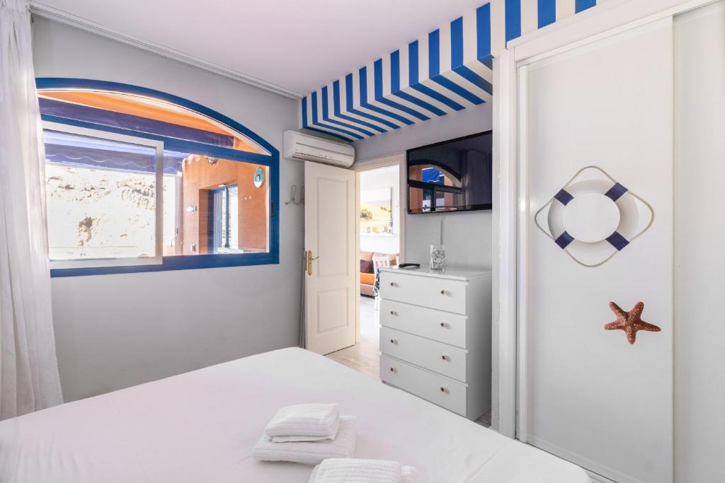 Postel nebo postele na pokoji v ubytování Flatguest Balcon de Taurito