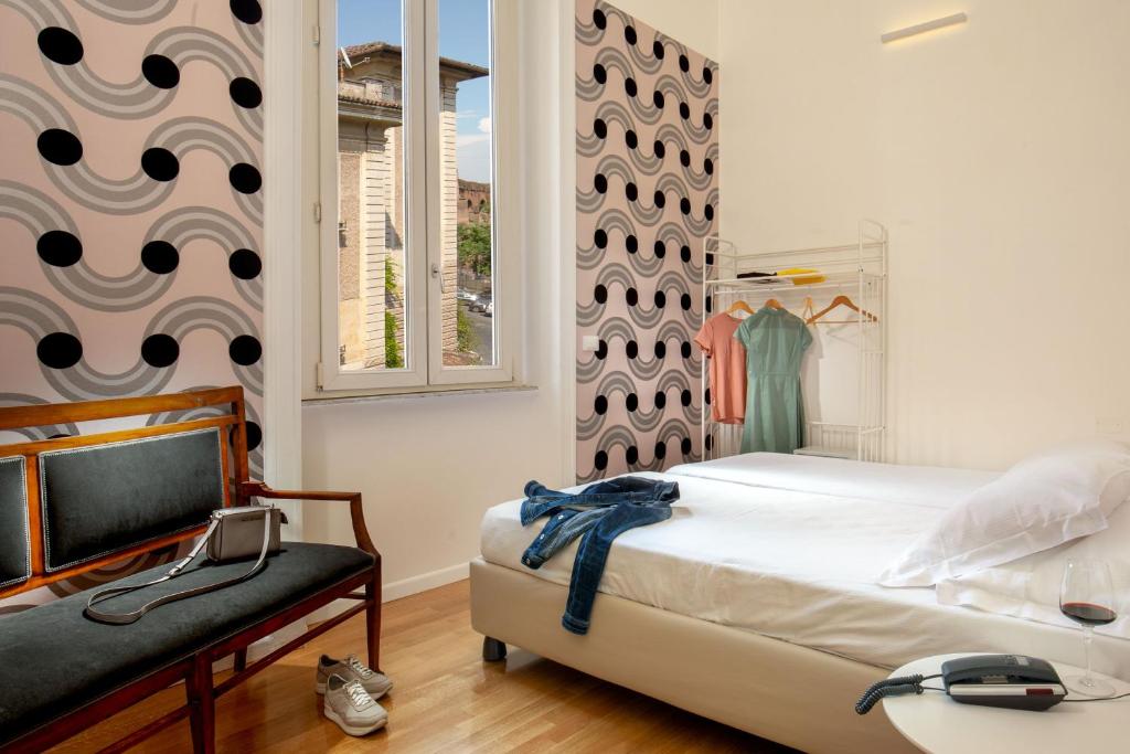 Postel nebo postele na pokoji v ubytování Hotel Emona Aquaeductus