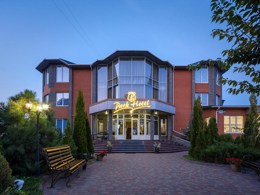 a building with a sign that reads park hotel at Park Hotel in Khmelnytskyi