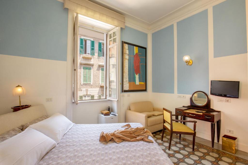 Postel nebo postele na pokoji v ubytování Hotel Emona Aquaeductus