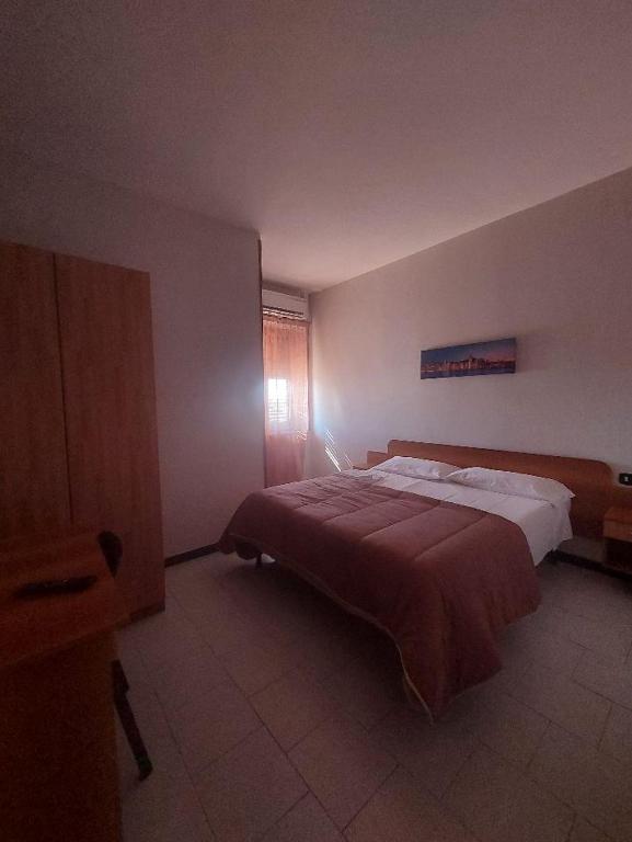 Postel nebo postele na pokoji v ubytování hotel pie d'or