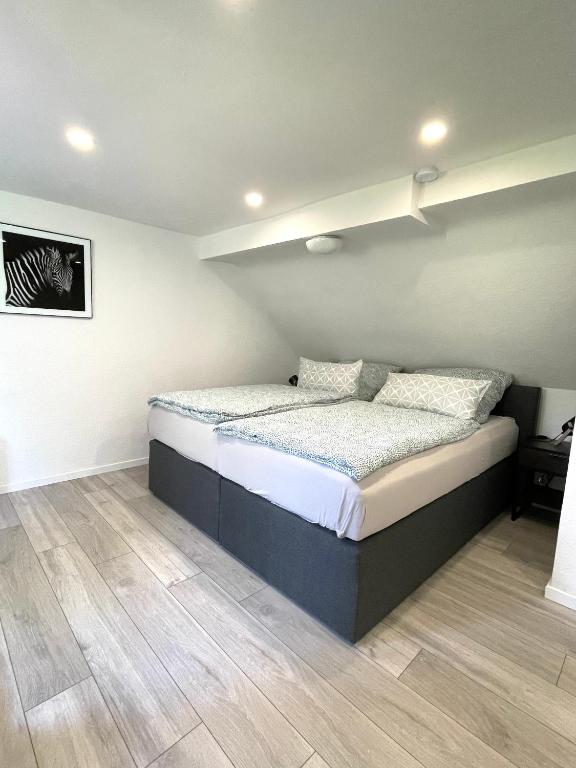 Postel nebo postele na pokoji v ubytování Ferienhaus Sonnendeck 2