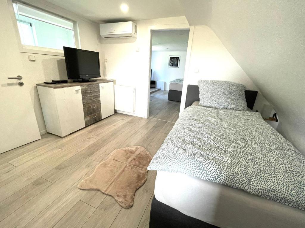 Postel nebo postele na pokoji v ubytování Ferienhaus Sonnendeck 2