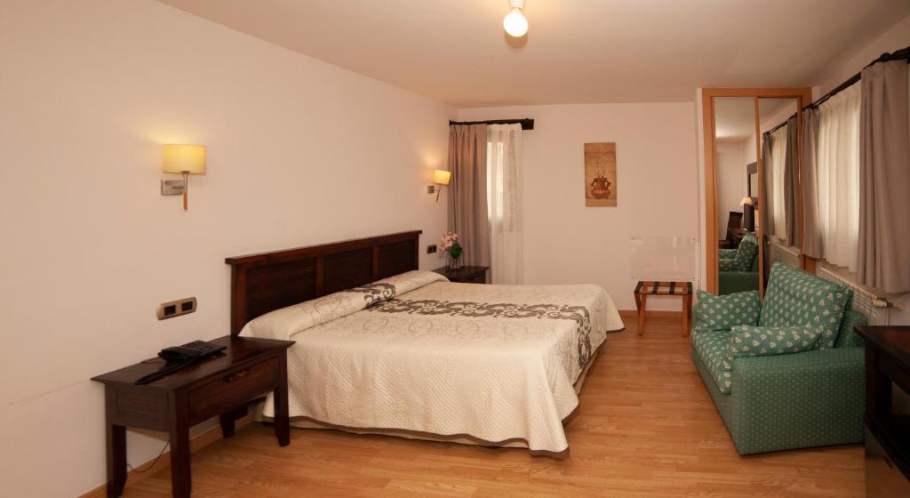 Postel nebo postele na pokoji v ubytování Hotel Rural Casa de Campo