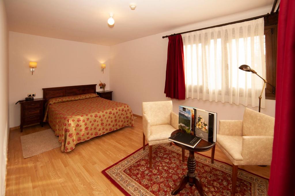 Postel nebo postele na pokoji v ubytování Hotel Rural Casa de Campo