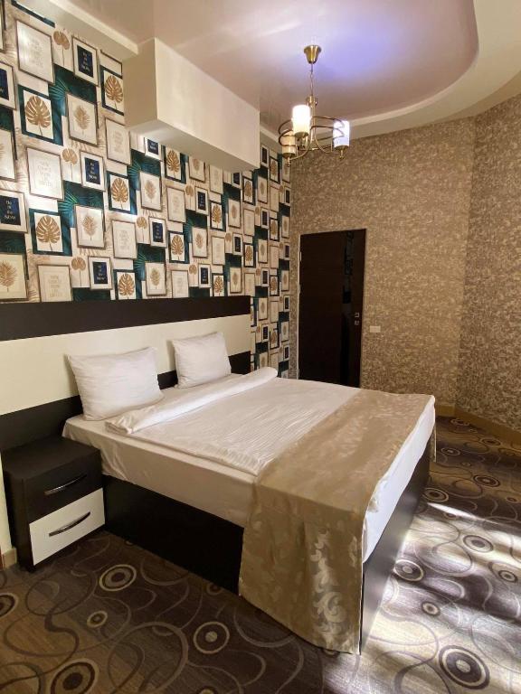Postel nebo postele na pokoji v ubytování Premium Hotel Yerevan
