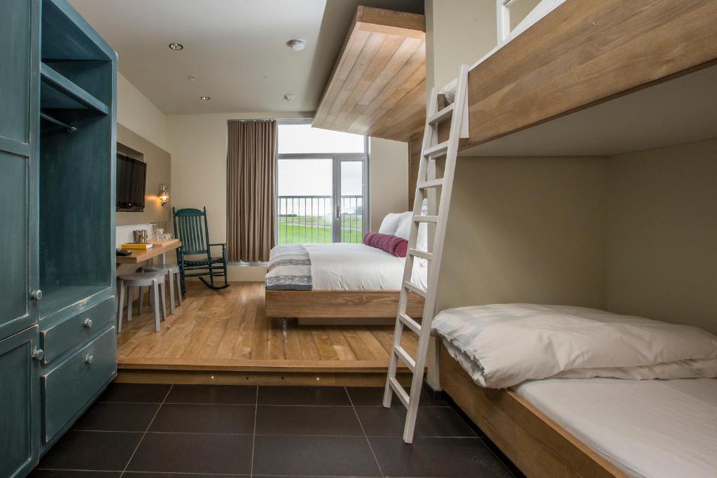 Postel nebo postele na pokoji v ubytování Hôtel & Spa Le Germain Charlevoix