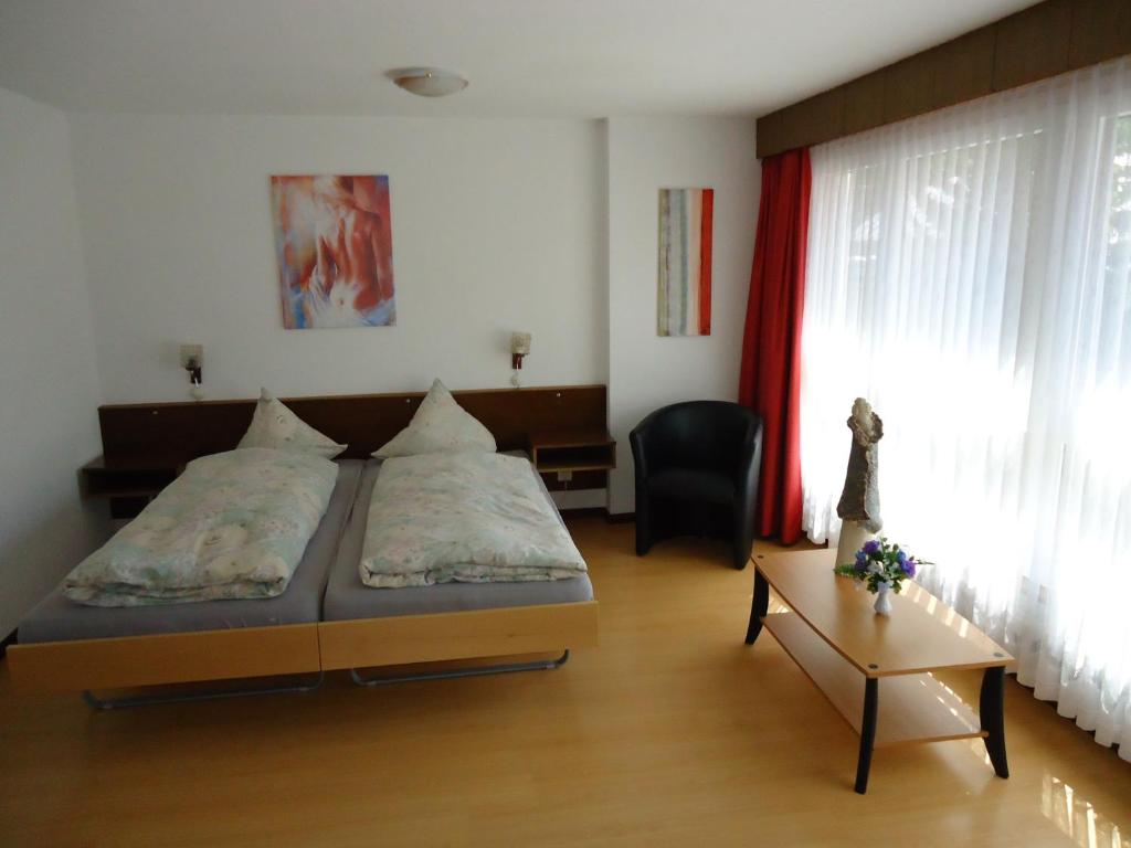Postel nebo postele na pokoji v ubytování Hotel Primavera