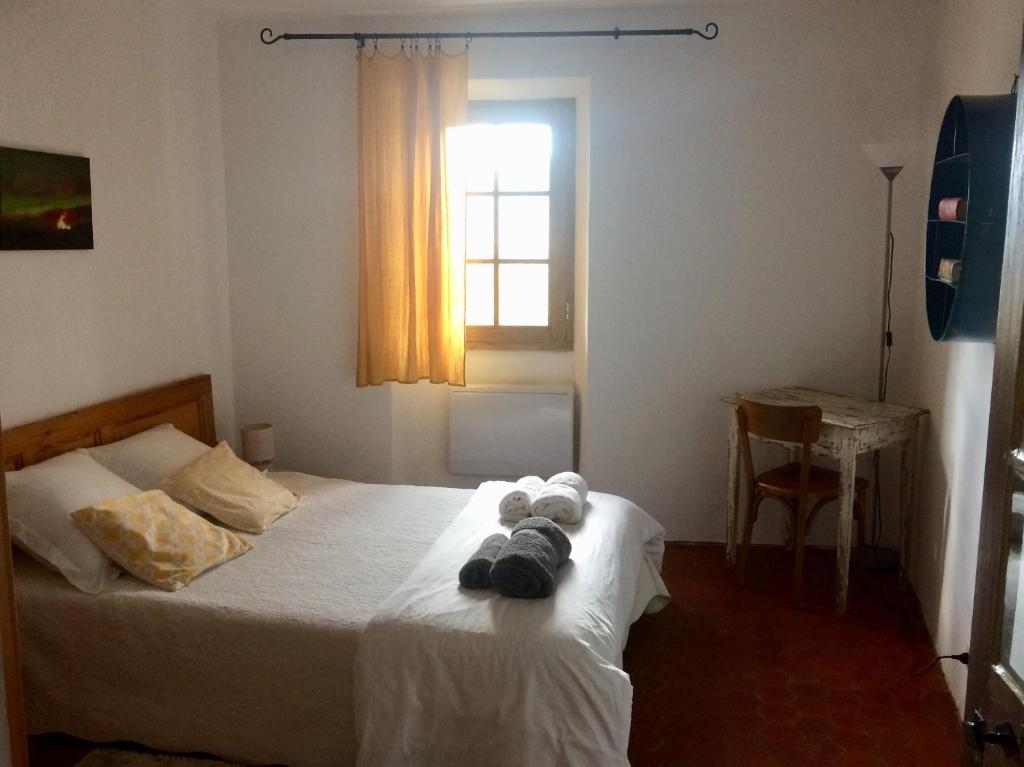 Postel nebo postele na pokoji v ubytování LA MAISON D’ALICE
