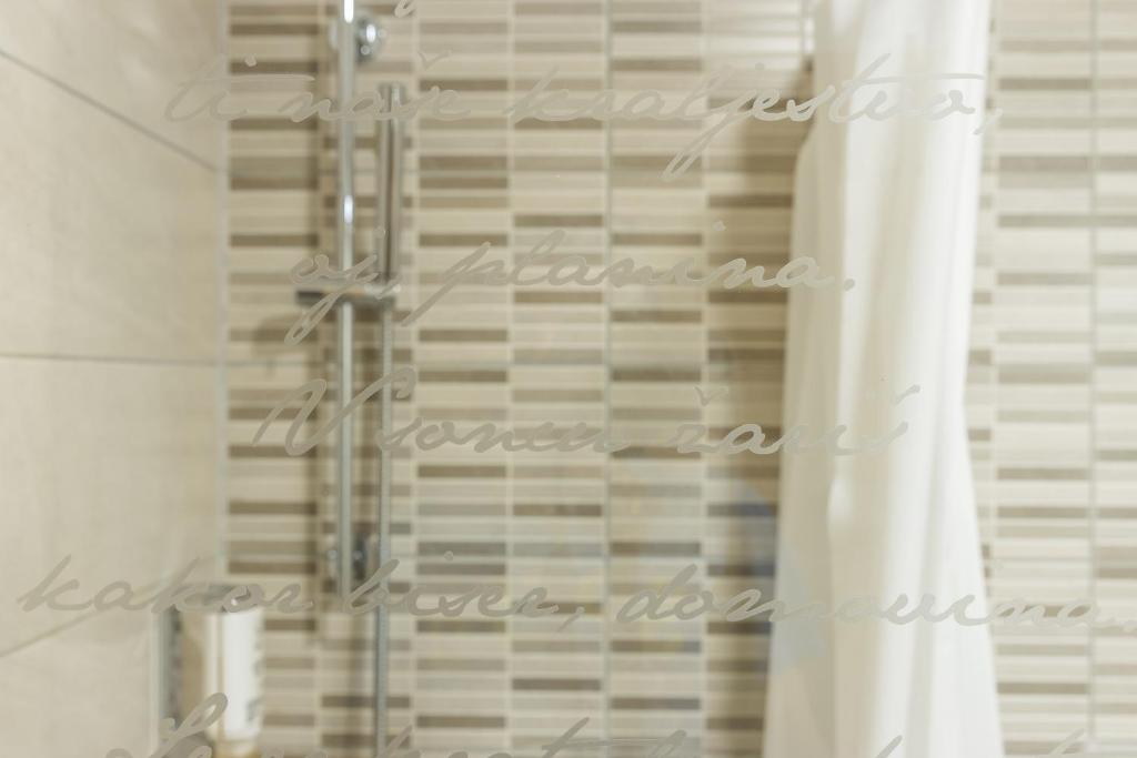 Koupelna v ubytování Boutique rooms Pri Rogovilcu