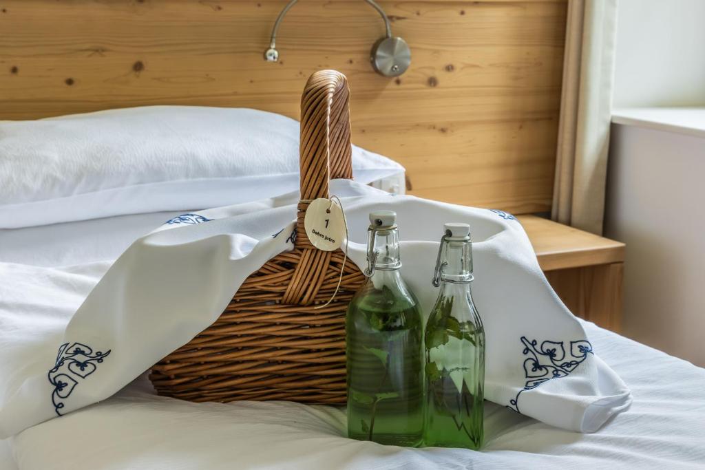 Postel nebo postele na pokoji v ubytování Boutique rooms Pri Rogovilcu